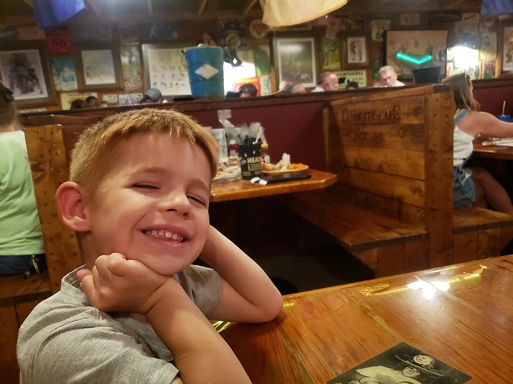 kid waiting for dinner at lamberts cafe