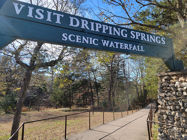 dripping springs scenic waterfall sign