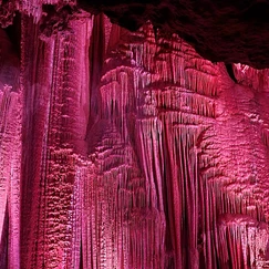 Illuminated pink flowstone