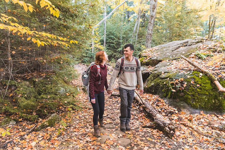 couple hiking in woods