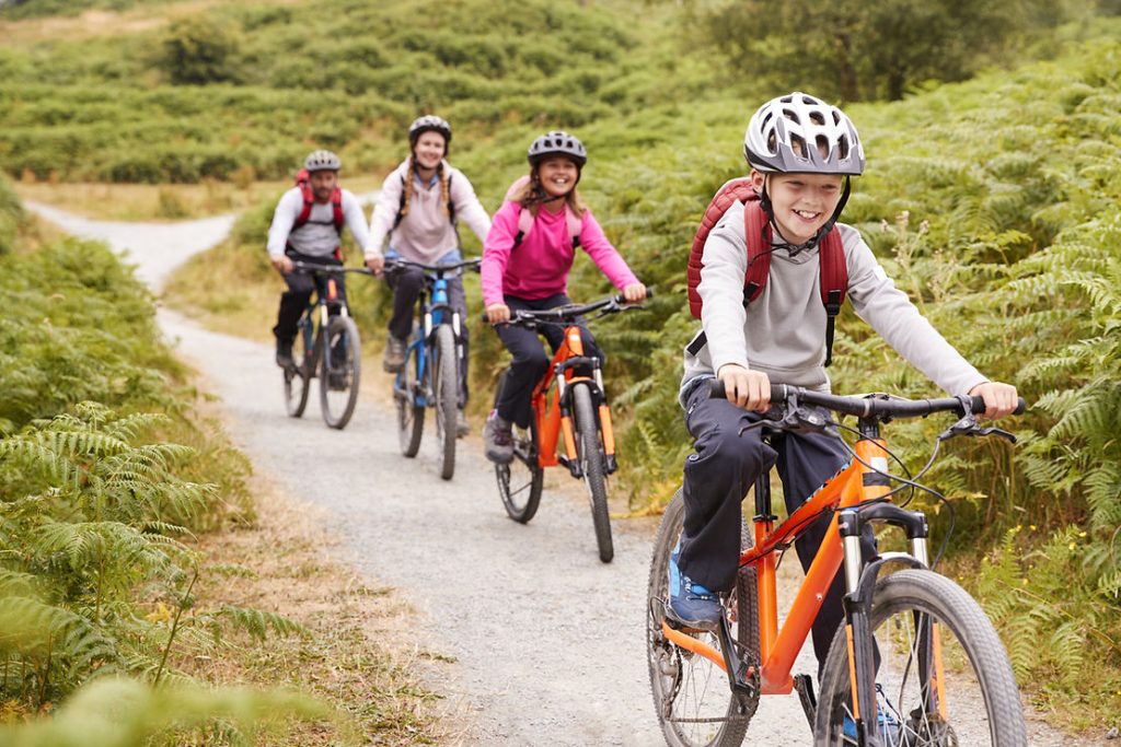 line of kids on bikes