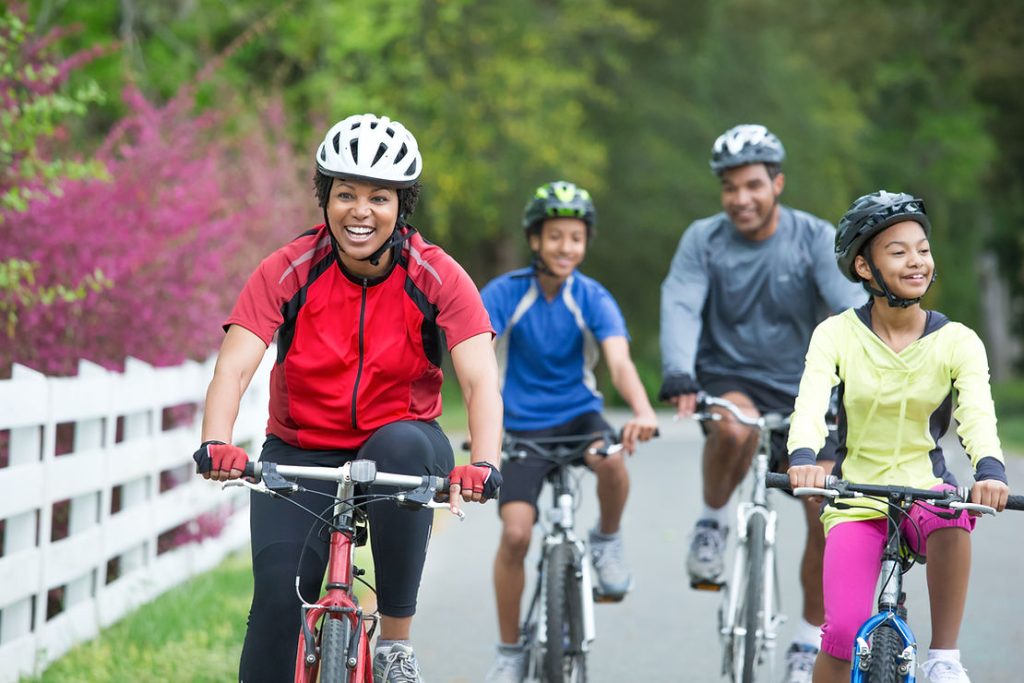 family riding bikes