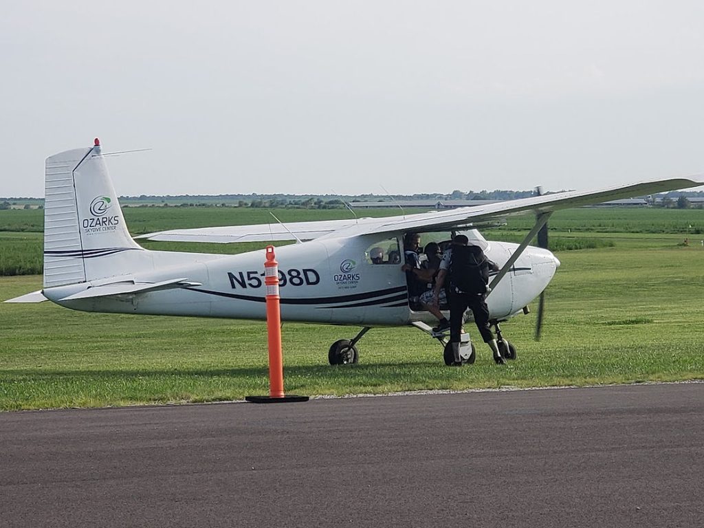 skydivers loading into plane