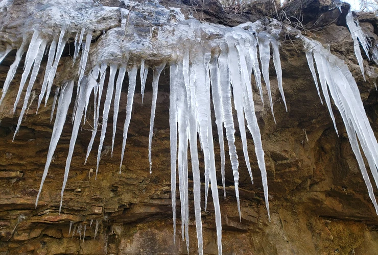 Icicle hanging from rocks 