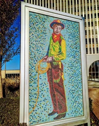 mosaic of cowboy holding a rope