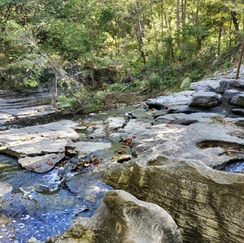 Rocks with running water going downhill