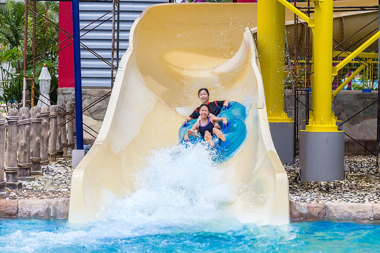 kids on a water slide